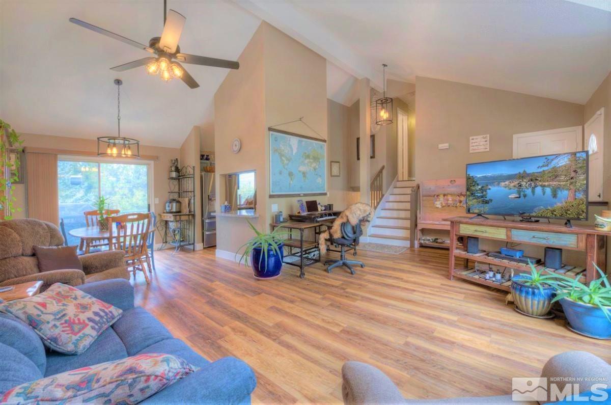 15135 Sylvester Road Reno, NV 89521 - Photo 5 of 34 a living room with furniture and wooden floor