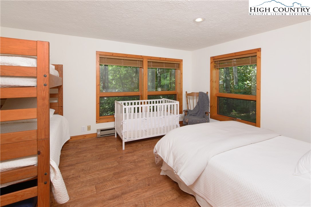35 Beagle Road Newland, NC 28657 - Photo 11 of 17 a spacious bedroom with two beds and a window