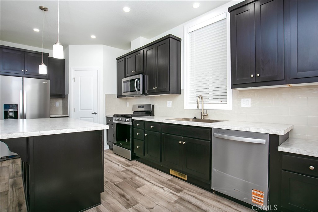 657 Lebec Road, Unit 2 Lebec, CA 93243 - Photo 9 of 17 a kitchen with a sink cabinets and window