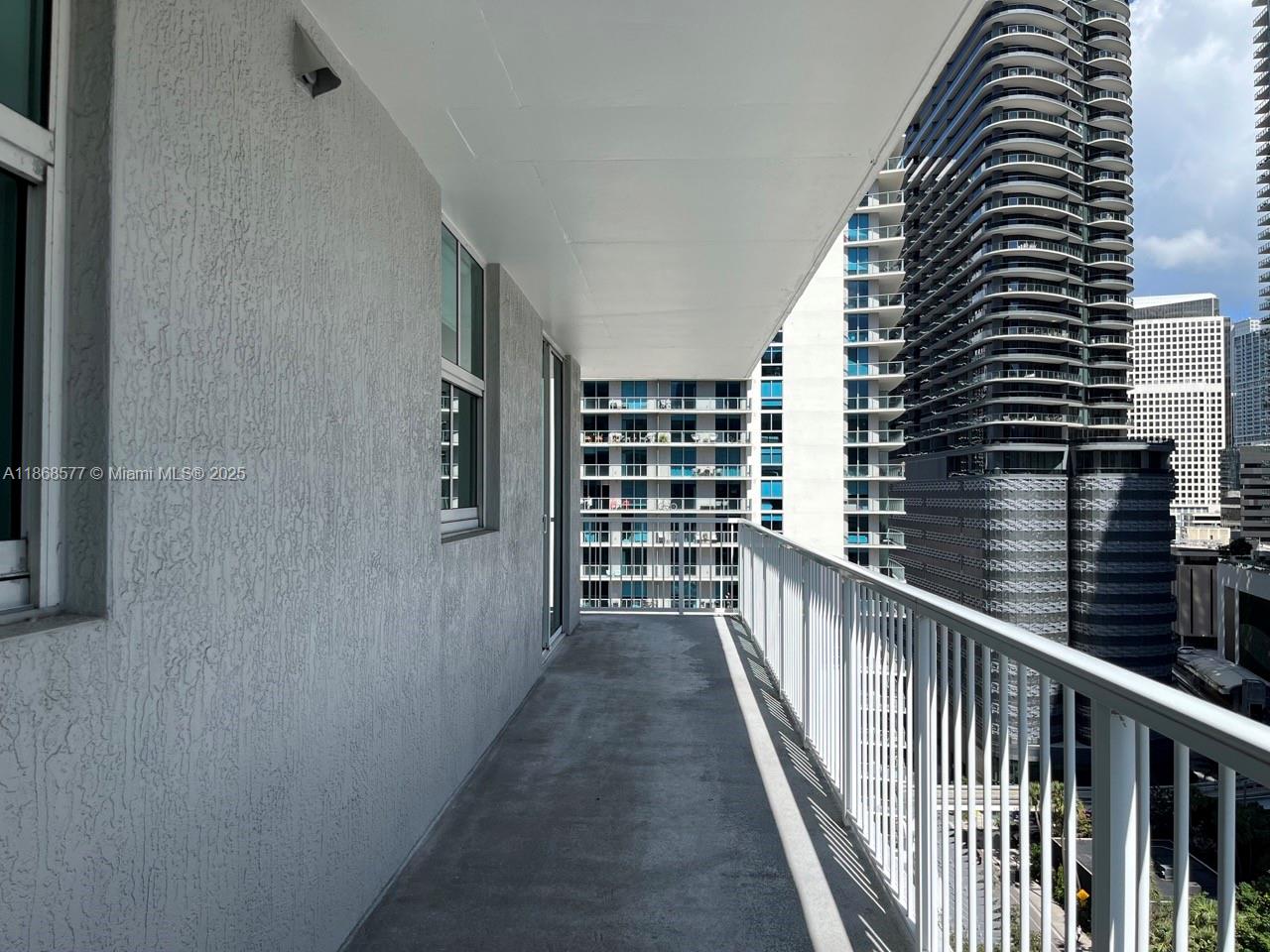 1250 South Miami Avenue, Unit 1414 Miami, FL 33130 - Photo 11 of 25 a view of a balcony with wooden floor