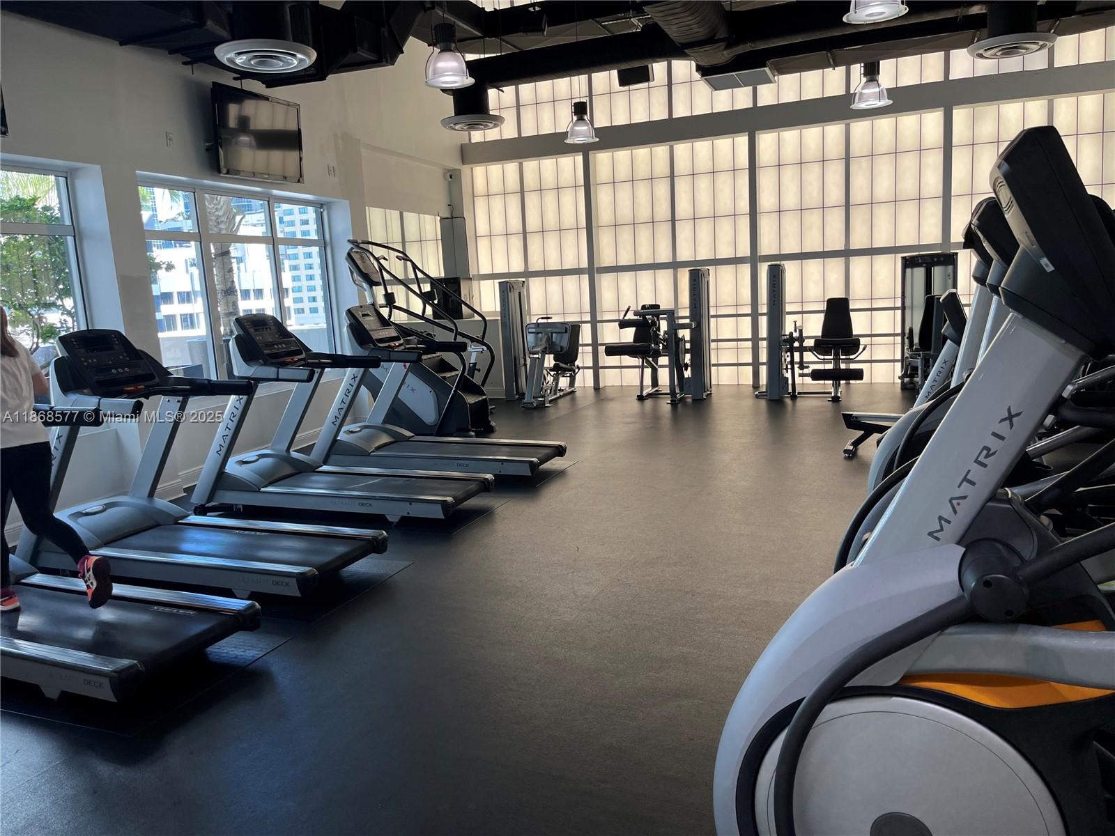 1250 South Miami Avenue, Unit 1414 Miami, FL 33130 - Photo 24 of 25 a view of a room with gym equipment