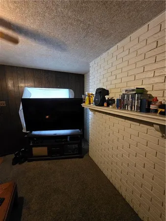 a kitchen with sink and cabinets