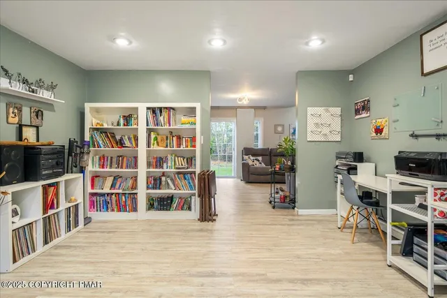 a view of a workspace with furniture