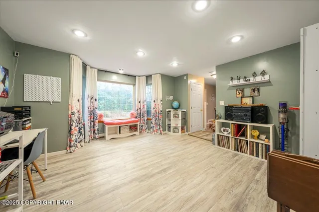 a room with furniture and a window