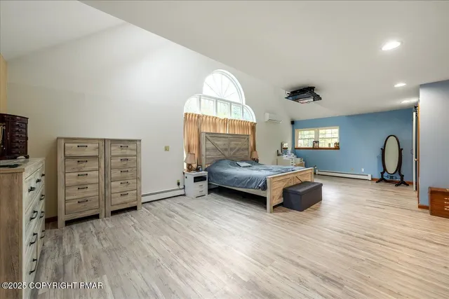 a room with a window and gym equipment