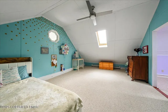 a view of a forest with a street