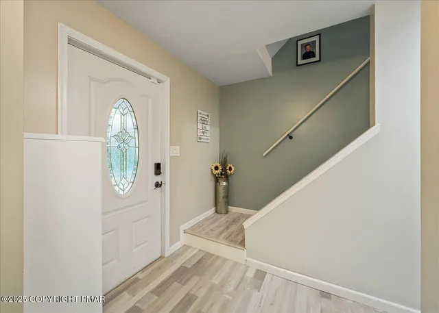 a view of a bedroom from a hallway