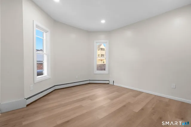 an empty room with windows