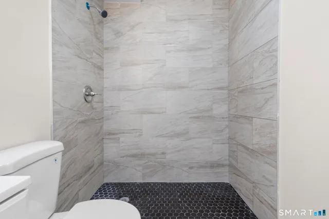 a bathroom with a toilet