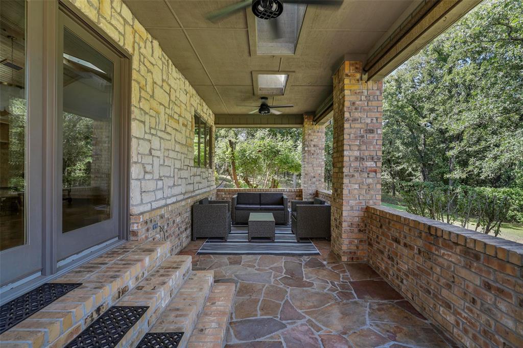 2243 Wood Hollow Road Denton, TX 76208 - Photo 17 of 40 Covered portion of back patio with relaxing fan
