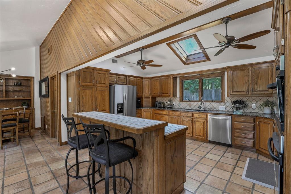 2243 Wood Hollow Road Denton, TX 76208 - Photo 24 of 40 Original open concept kitchen with breakfast/sitting area and built-in desk