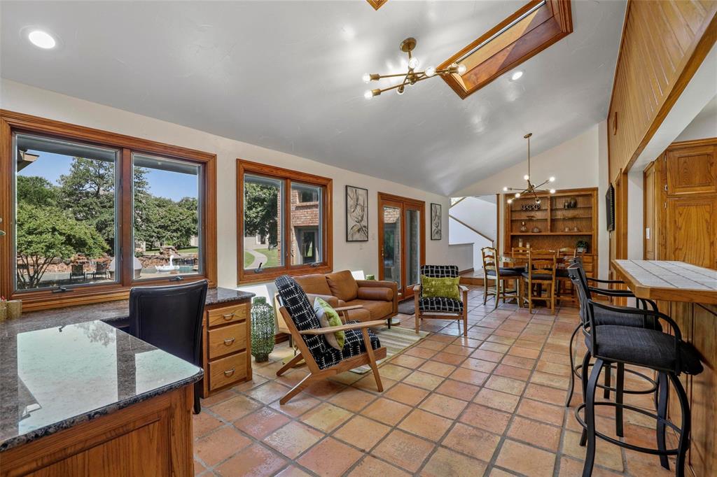 2243 Wood Hollow Road Denton, TX 76208 - Photo 26 of 40 Built in desk and sitting area between dining room and living room