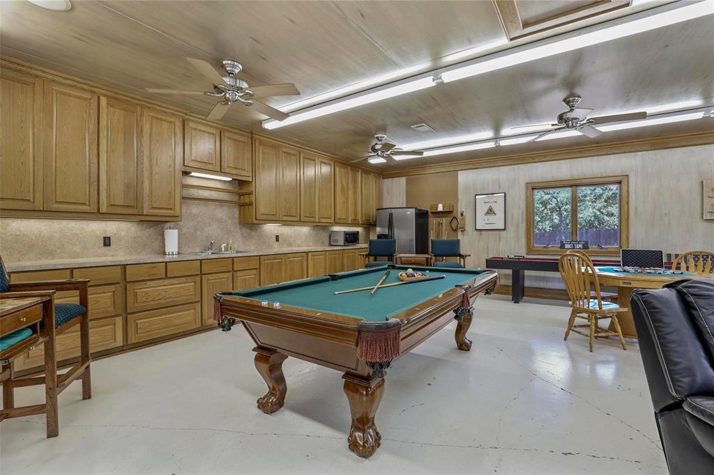 2243 Wood Hollow Road Denton, TX 76208 - Photo 38 of 40 877 sqft workshop currently a game room