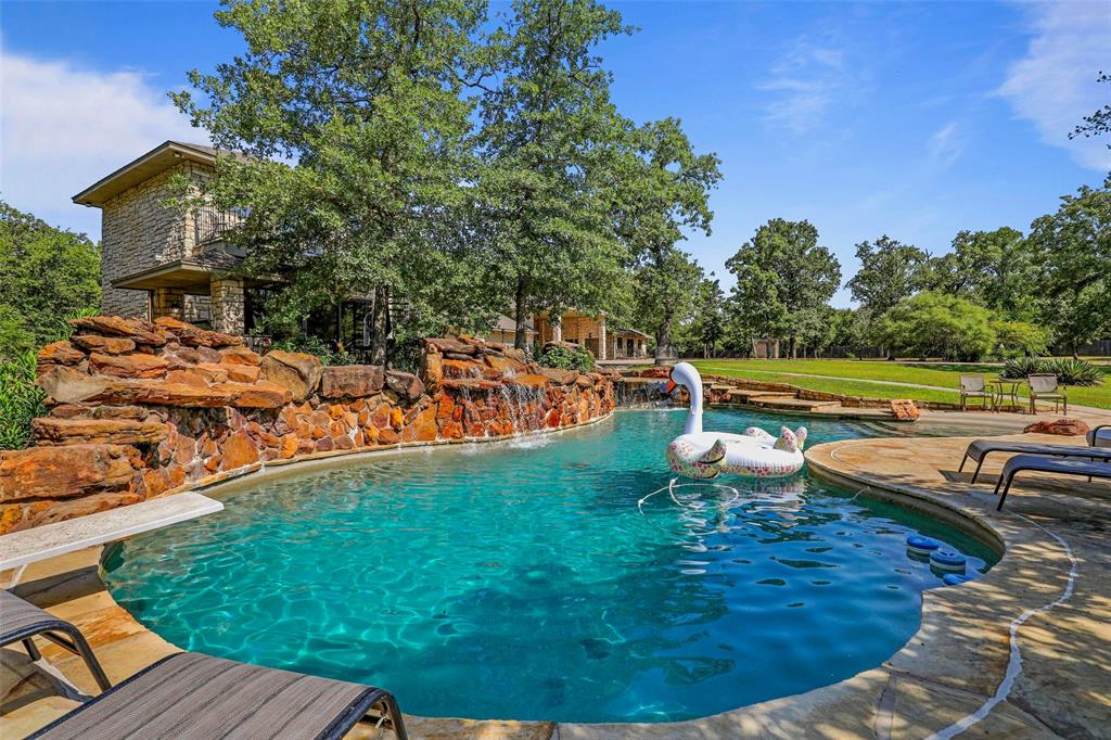 2243 Wood Hollow Road Denton, TX 76208 - Photo 5 of 40 Resort style pool with 3 waterfalls