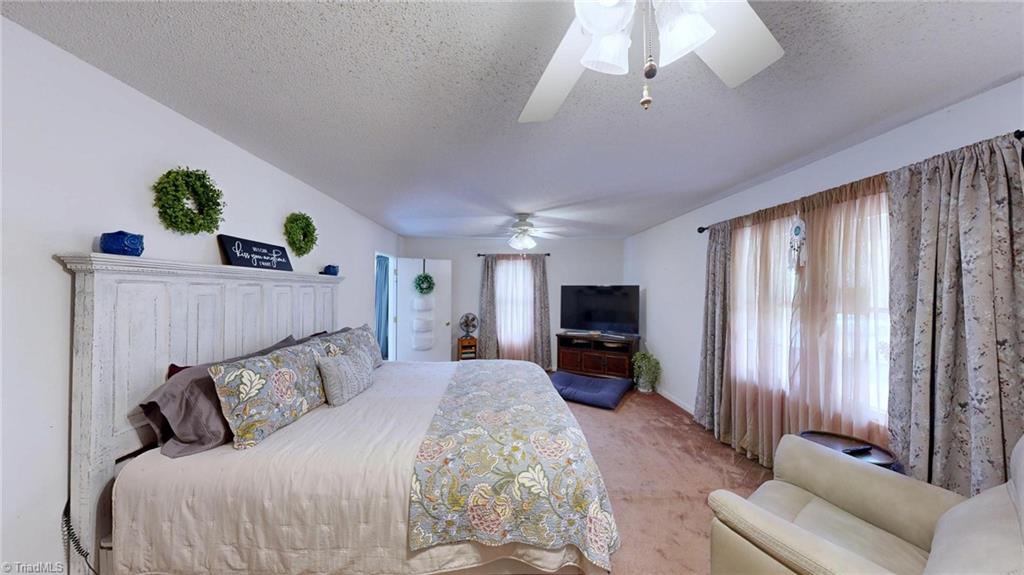 2091 Whitt Hunt Road Pleasant Garden, NC 27313 - Photo 21 of 27 Primary Bedroom