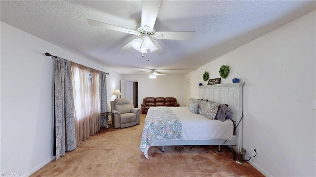 2091 Whitt Hunt Road Pleasant Garden, NC 27313 - Photo 22 of 27 Primary Bedroom