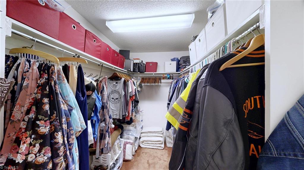 2091 Whitt Hunt Road Pleasant Garden, NC 27313 - Photo 23 of 27 Primary walk in closet
