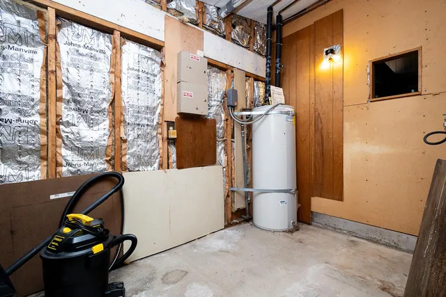 a view of living room with furniture and a flat screen tv