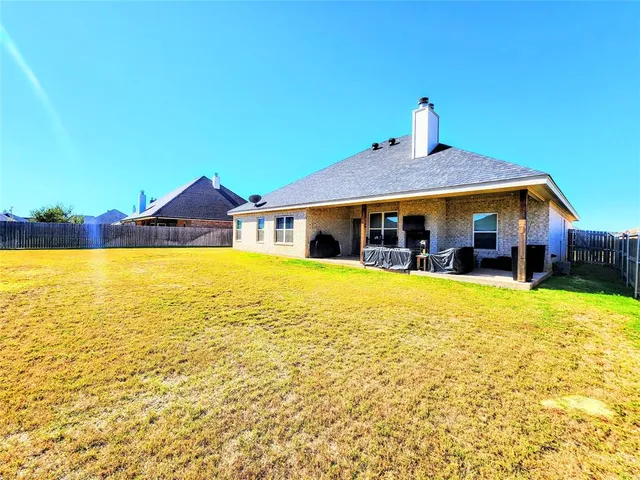 a front view of house with swimming pool
