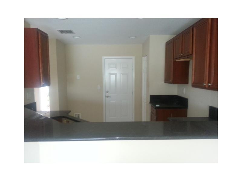 5892 Abbey Road, Unit 5892 Tamarac, FL 33321 - Photo 3 of 10 Kitchen