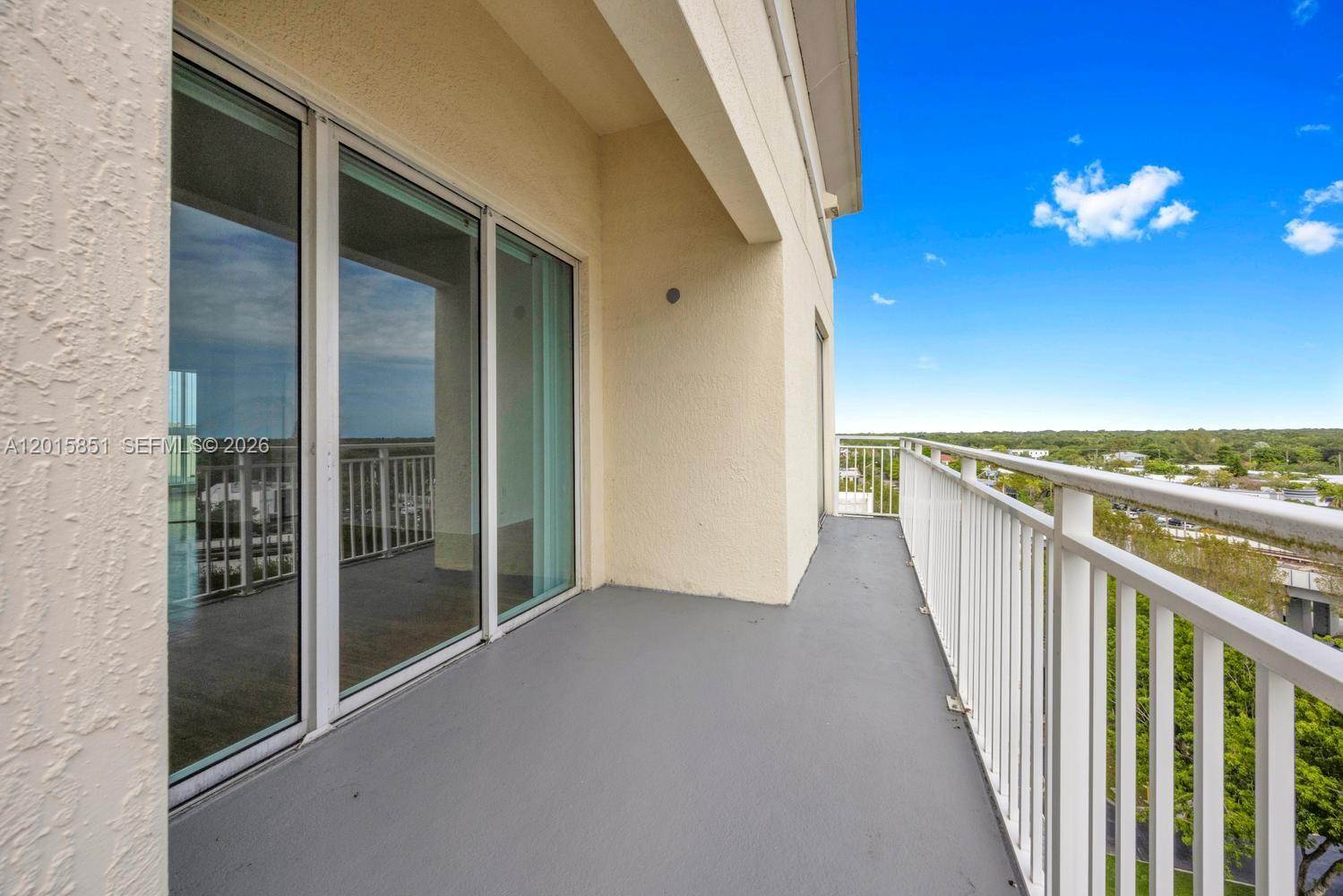 7275 Southwest 90th Street, Unit C719 Miami, FL 33156 - Photo 20 of 25 a view of a livingroom with wooden floor