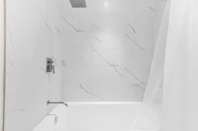 a close up of a bathtub