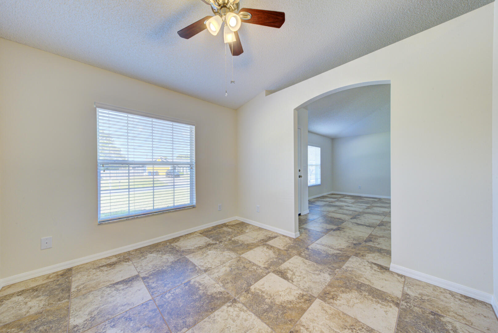 1453 Goyer Road Southeast Palm Bay, FL 32909 - Photo 11 of 41 dining room with fan