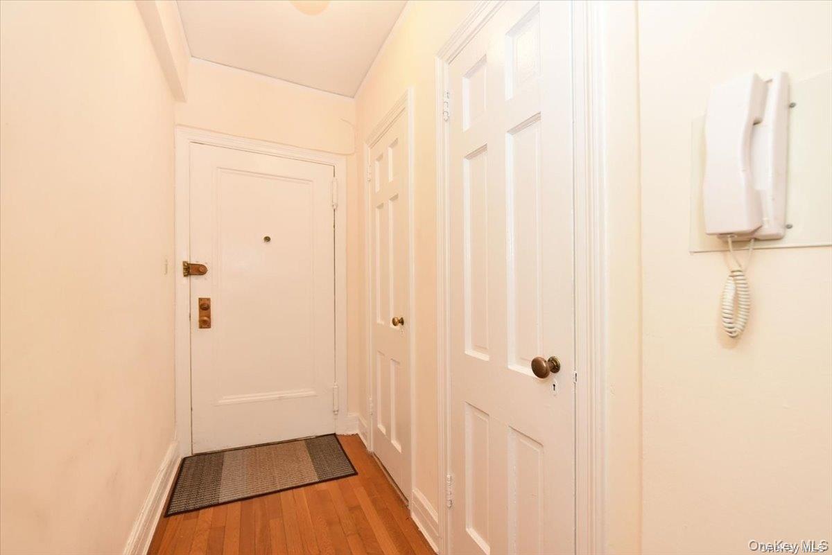 175-06 Devonshire Road, Unit 1J Queens, NY 11432 - Photo 2 of 20 a bathroom with a bathtub and shower