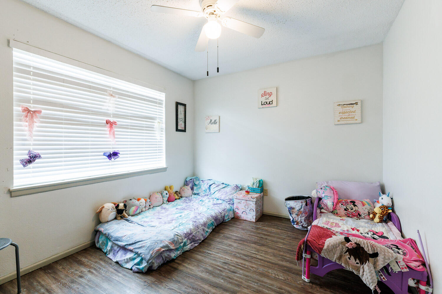 1907 73rd Street Lubbock, TX 79423 - Photo 23 of 41 a bedroom with a bed and a window