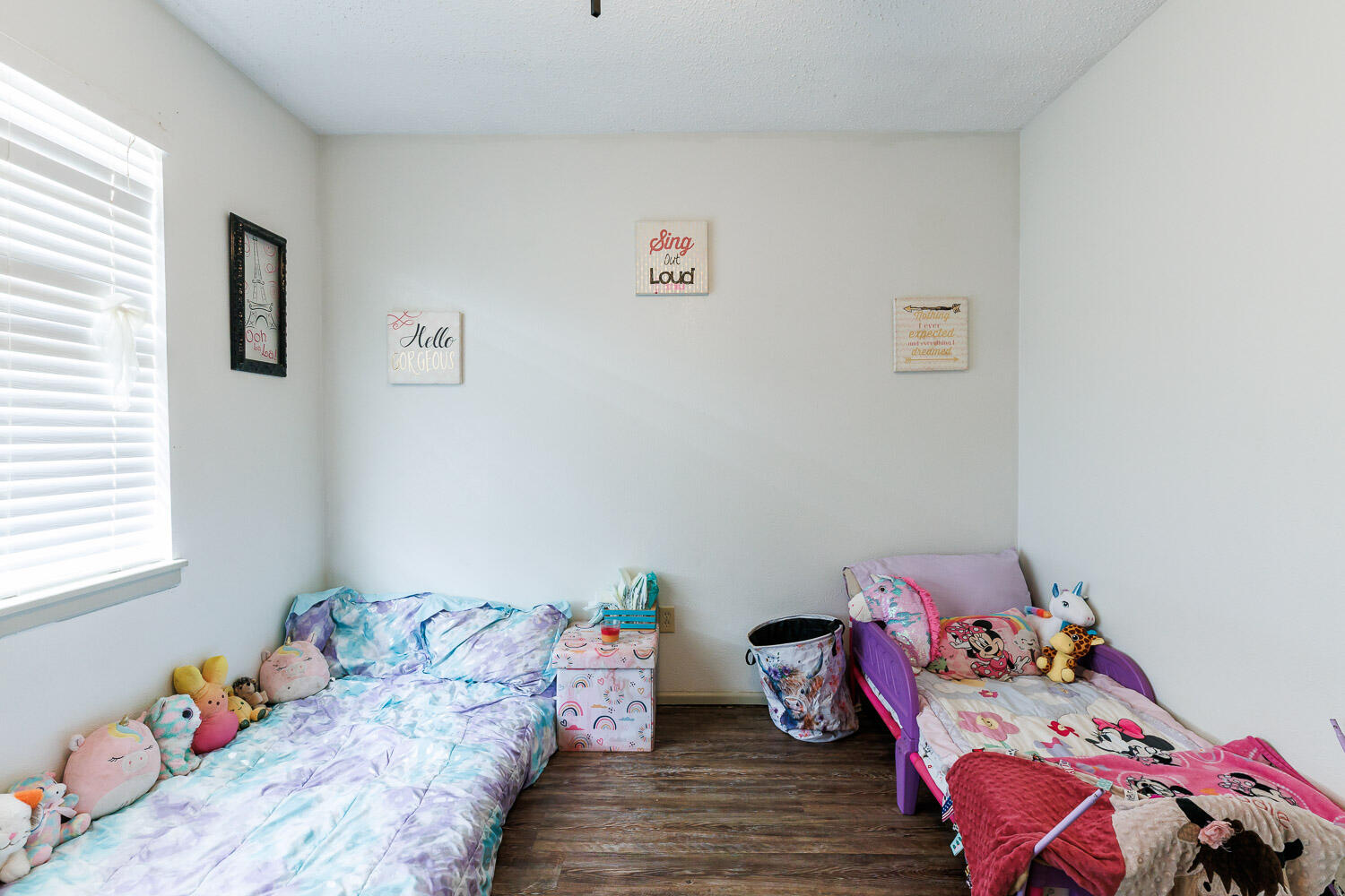 1907 73rd Street Lubbock, TX 79423 - Photo 24 of 41 a bedroom with a bed and window