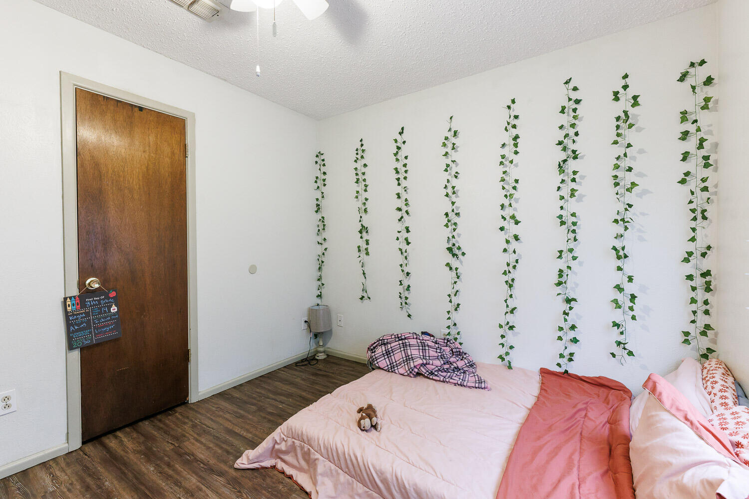 1907 73rd Street Lubbock, TX 79423 - Photo 25 of 41 a bedroom with a bed and a window