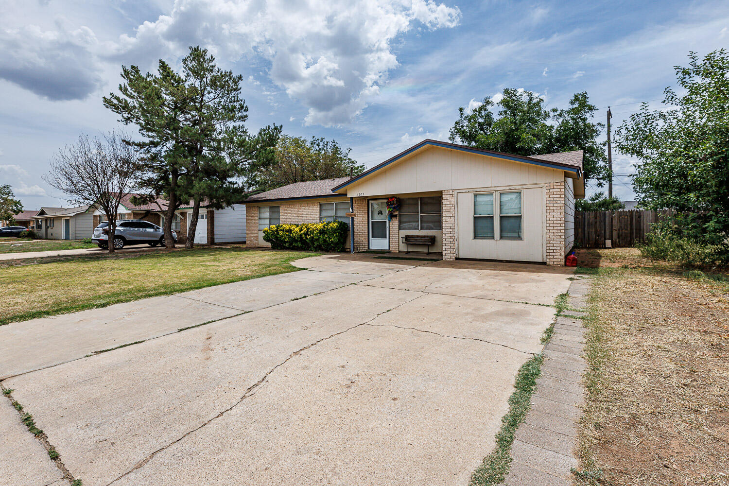 1907 73rd Street Lubbock, TX 79423 - Photo 41 of 41 a view of a house with a yard