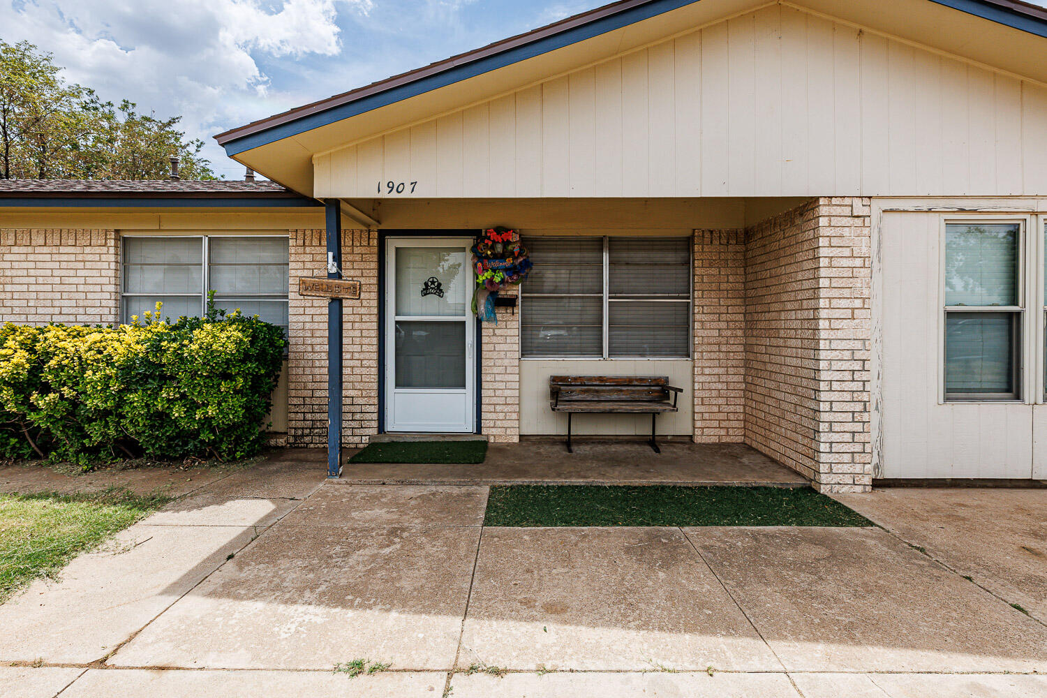 1907 73rd Street Lubbock, TX 79423 - Photo 5 of 41 a view of a porch with a bench and plants