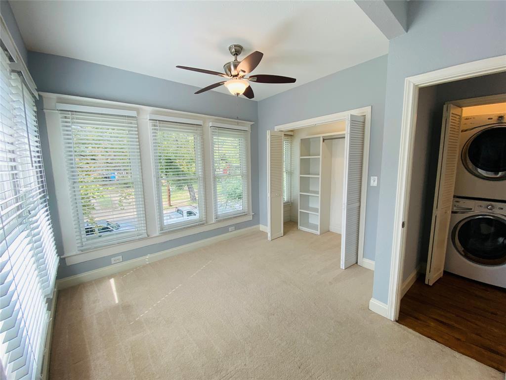 4318 Junius Street, Unit 3 Dallas, TX 75246 - Photo 15 of 29 a view of a livingroom with a ceiling fan and window