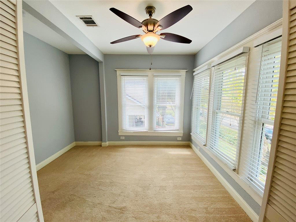 4318 Junius Street, Unit 3 Dallas, TX 75246 - Photo 20 of 29 a view of an empty room with a window