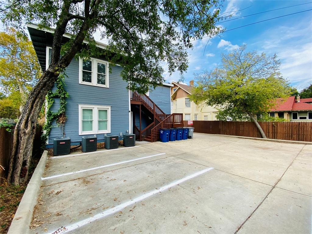 4318 Junius Street, Unit 3 Dallas, TX 75246 - Photo 26 of 29 a view of a house with a outdoor space