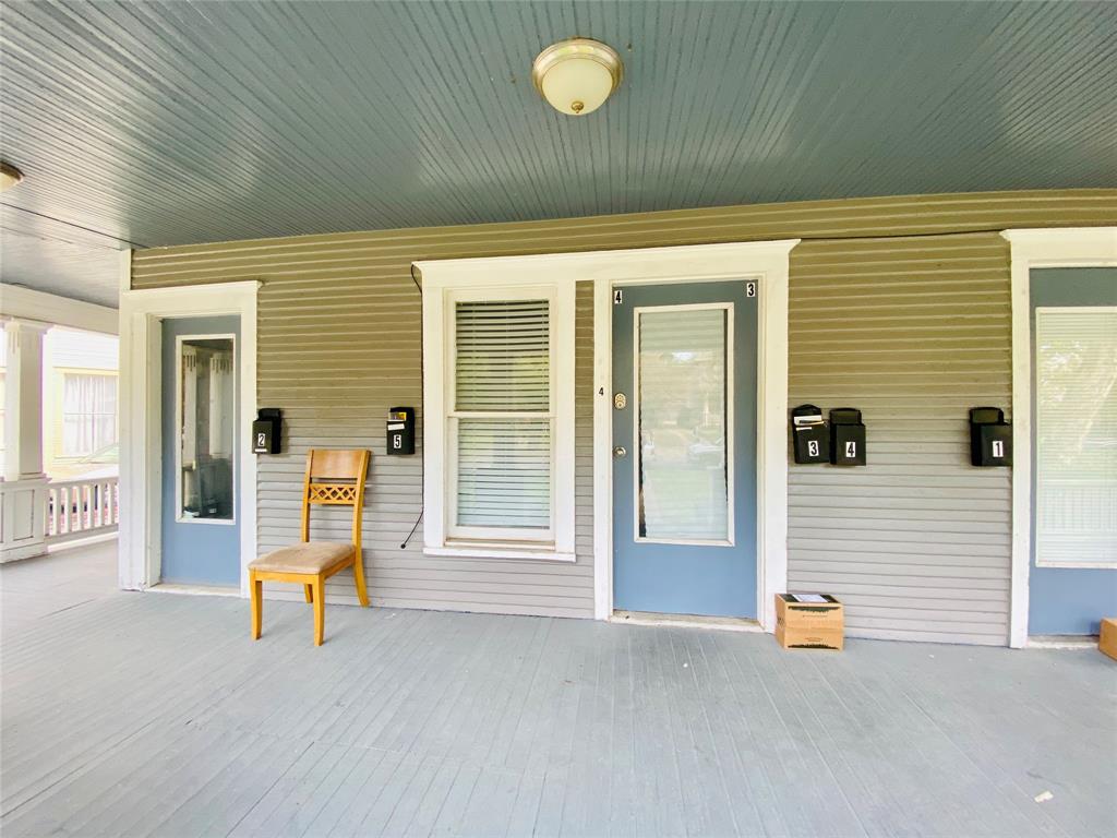 4318 Junius Street, Unit 3 Dallas, TX 75246 - Photo 3 of 29 a view of empty room with wooden floor and fan