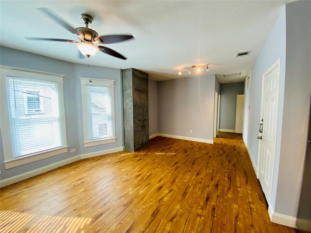 4318 Junius Street, Unit 3 Dallas, TX 75246 - Photo 8 of 29 a view of an empty room and window
