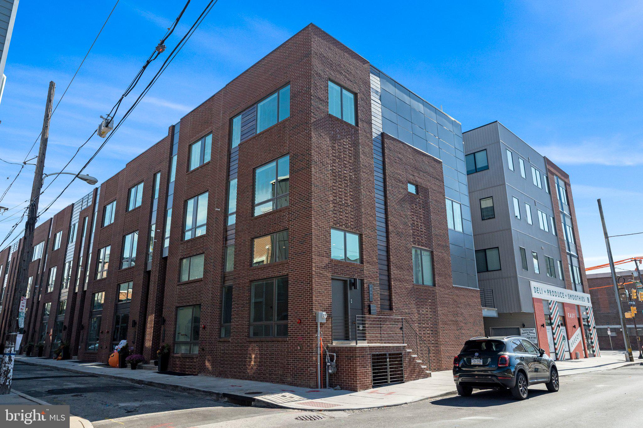 a car parked in front of a building