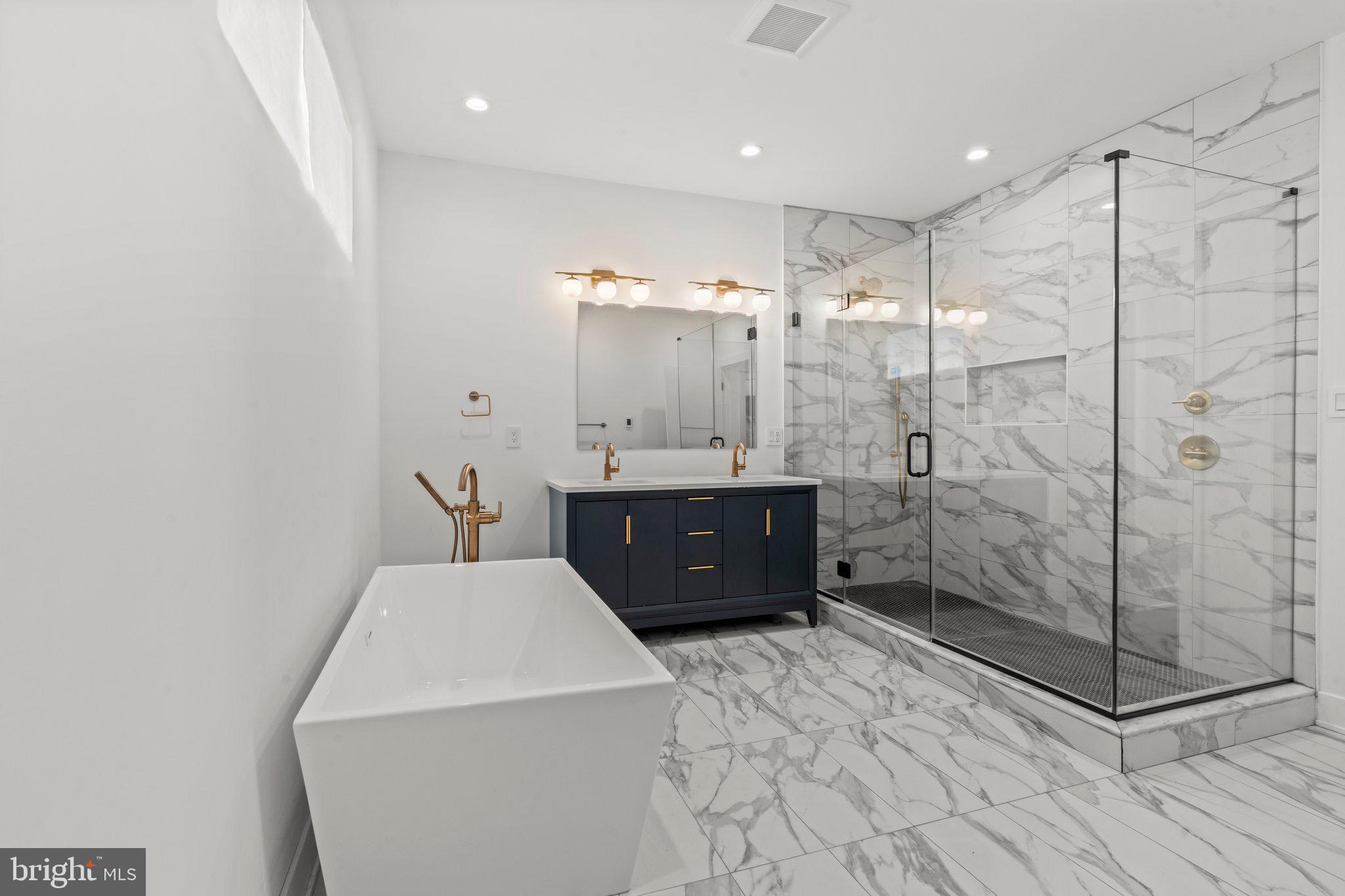 2240 League Street Philadelphia, PA 19146 - Photo 12 of 43 a bathroom with a sink a toilet and shower