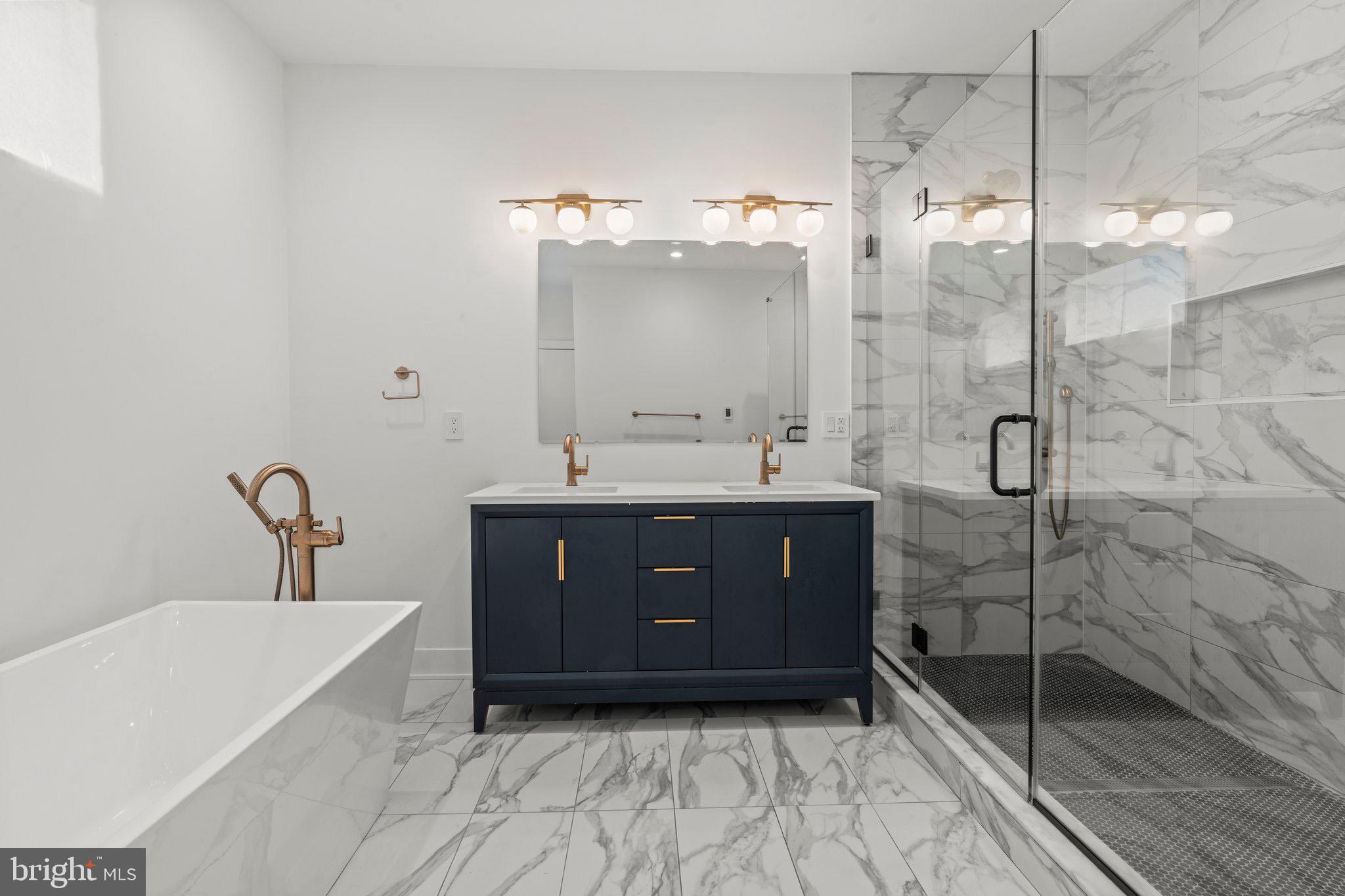 2240 League Street Philadelphia, PA 19146 - Photo 13 of 43 a bathroom with a sink a toilet and shower