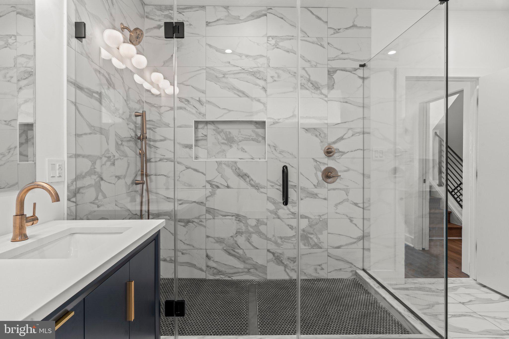 2240 League Street Philadelphia, PA 19146 - Photo 14 of 43 a bathroom with a sink shower and a mirror