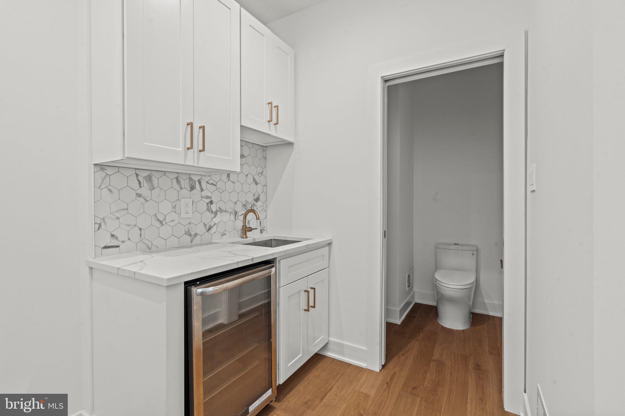 2240 League Street Philadelphia, PA 19146 - Photo 18 of 43 a view of bathroom with a sink toilet and a vanity