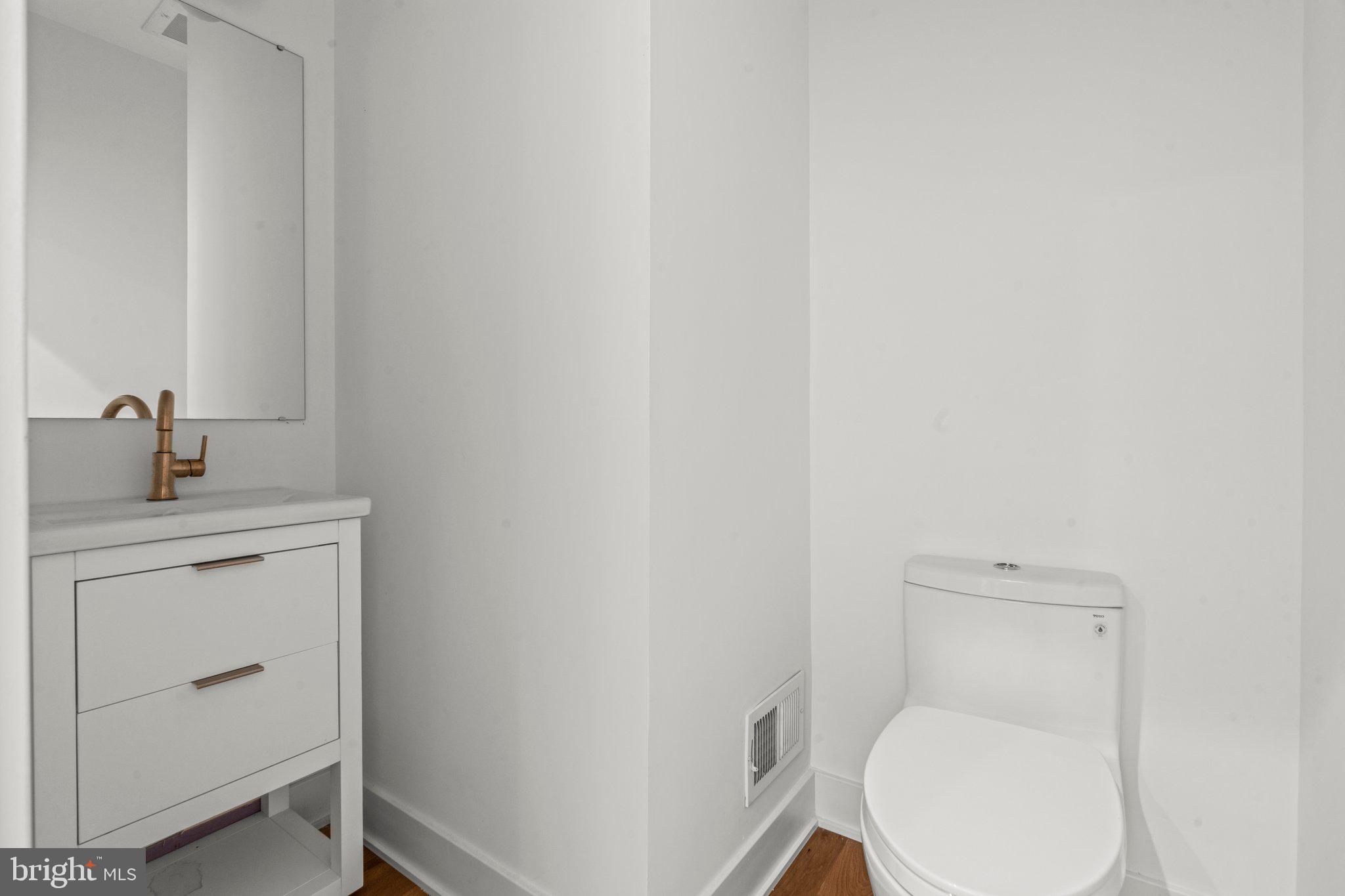 2240 League Street Philadelphia, PA 19146 - Photo 19 of 43 a bathroom with a toilet and a sink