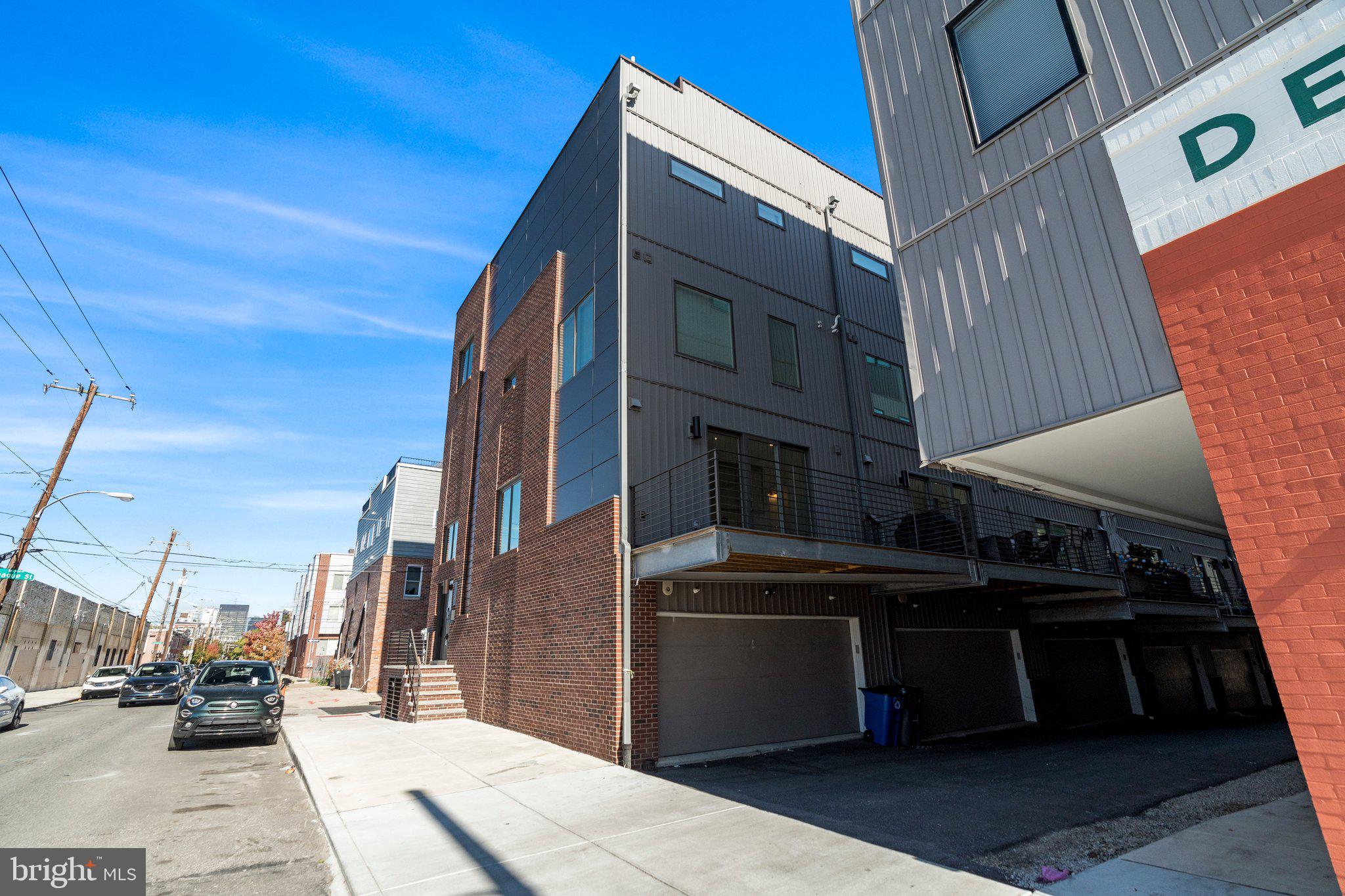 2240 League Street Philadelphia, PA 19146 - Photo 43 of 43 a street view with tall buildings