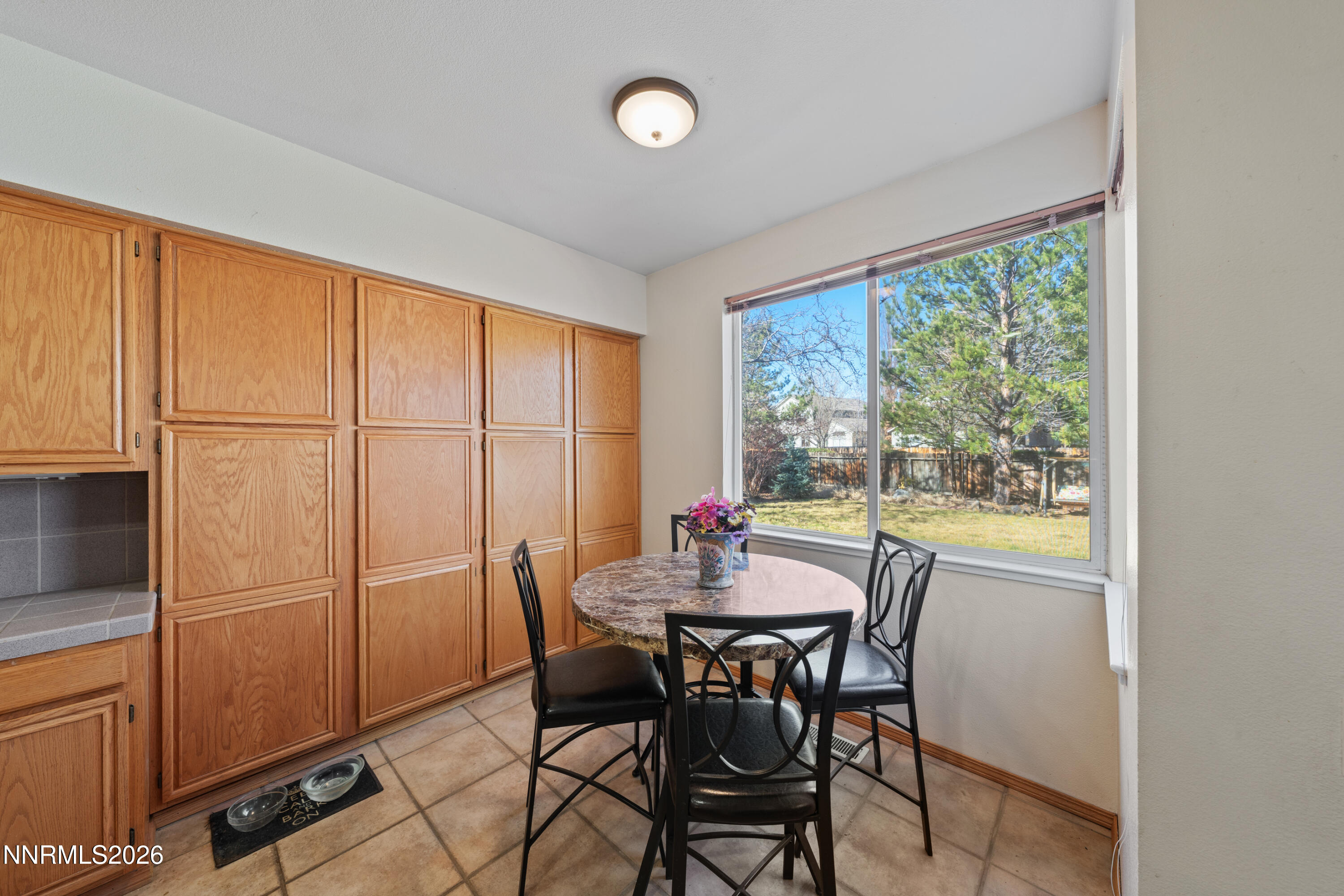 3225 Eaglewood Drive Reno, NV 89502 - Photo 12 of 45 a view of a dining room with furniture window and outside view