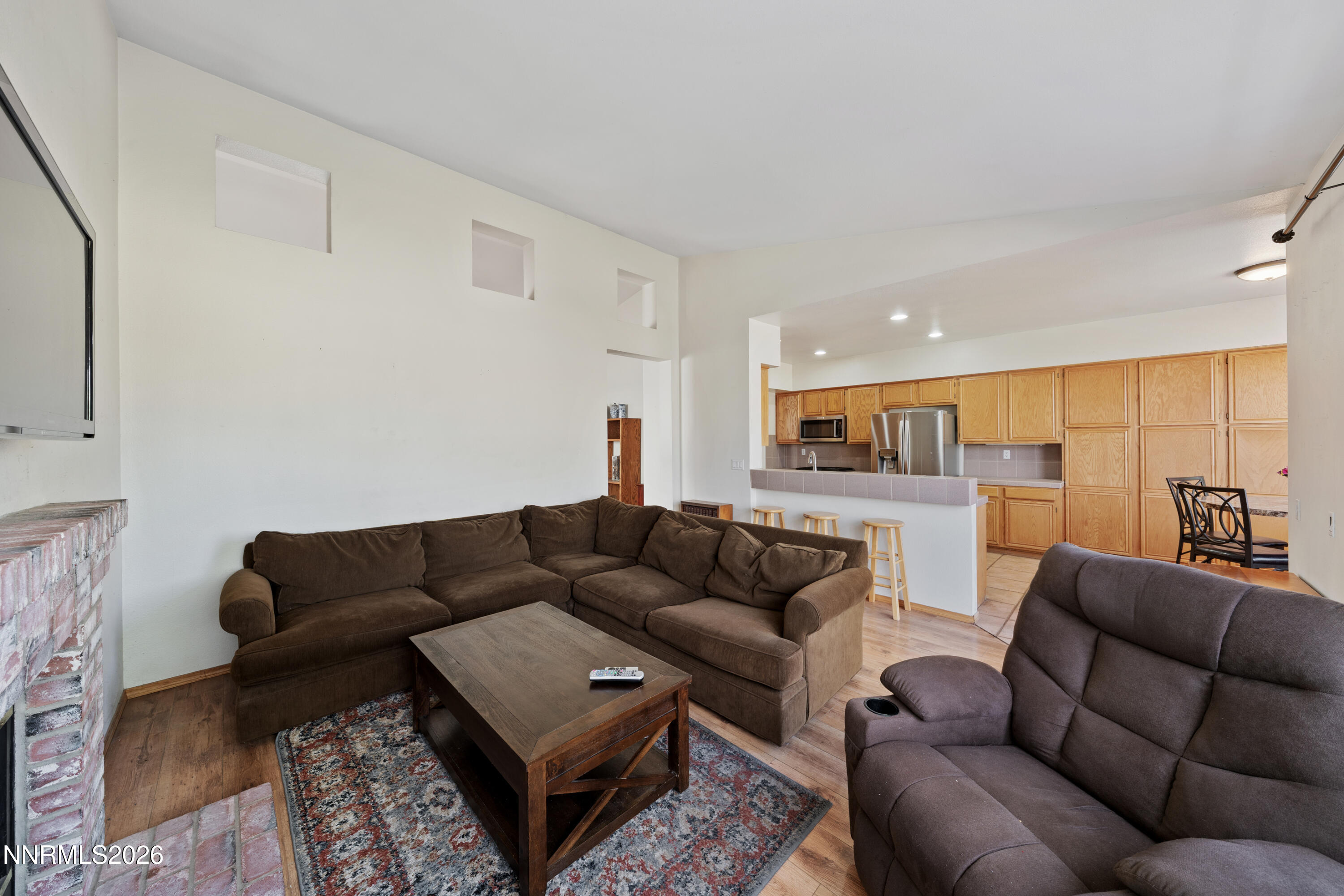 3225 Eaglewood Drive Reno, NV 89502 - Photo 14 of 45 a living room with furniture and view of kitchen