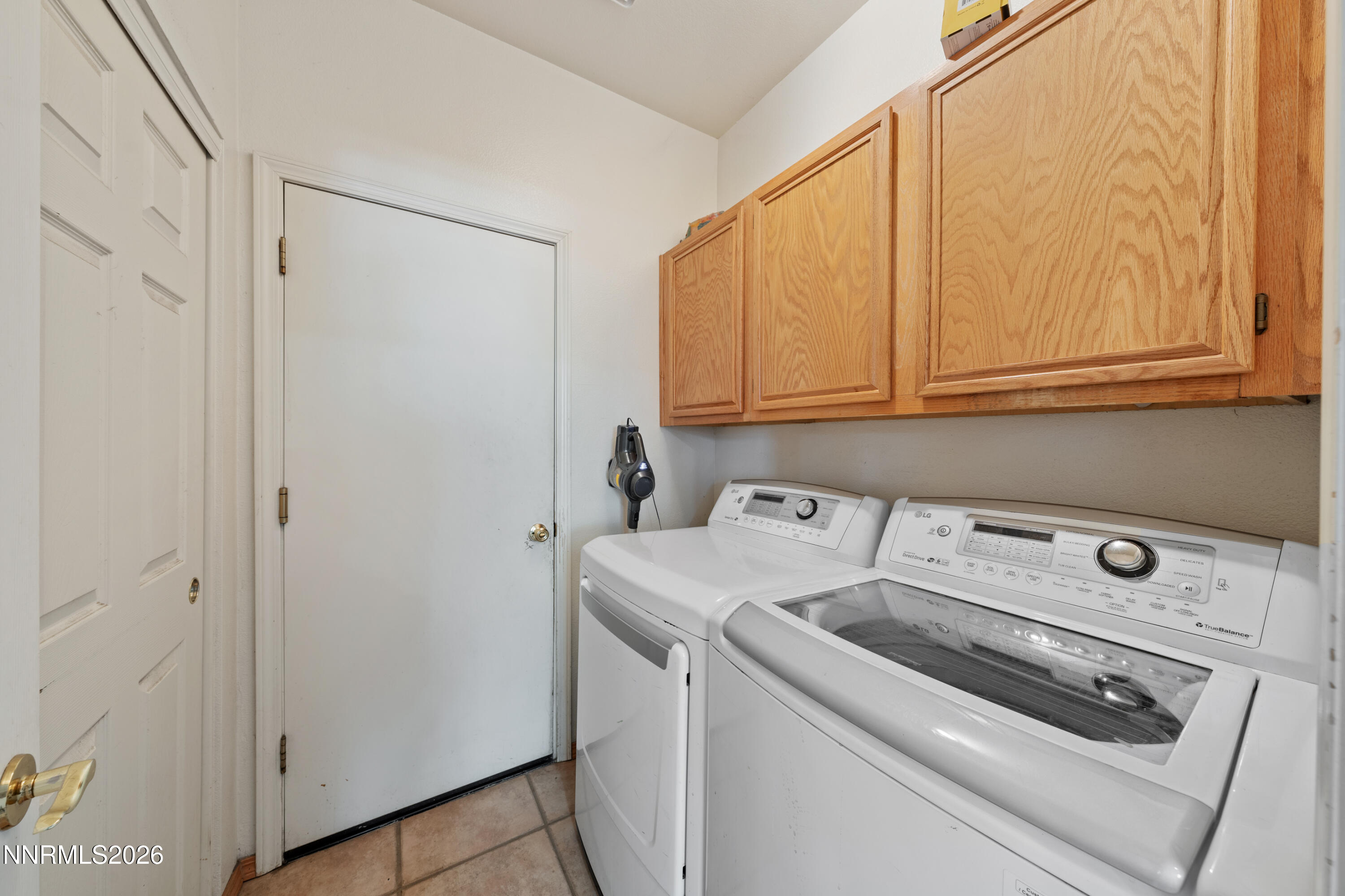 3225 Eaglewood Drive Reno, NV 89502 - Photo 17 of 45 a utility room with dryer and washer
