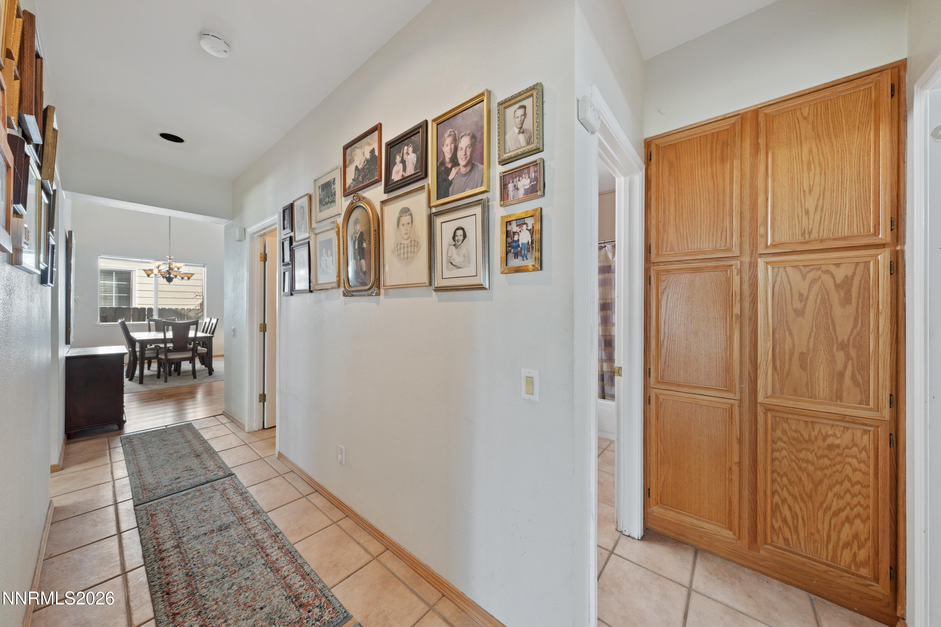 3225 Eaglewood Drive Reno, NV 89502 - Photo 18 of 45 a hallway with sliding door and bedroom view