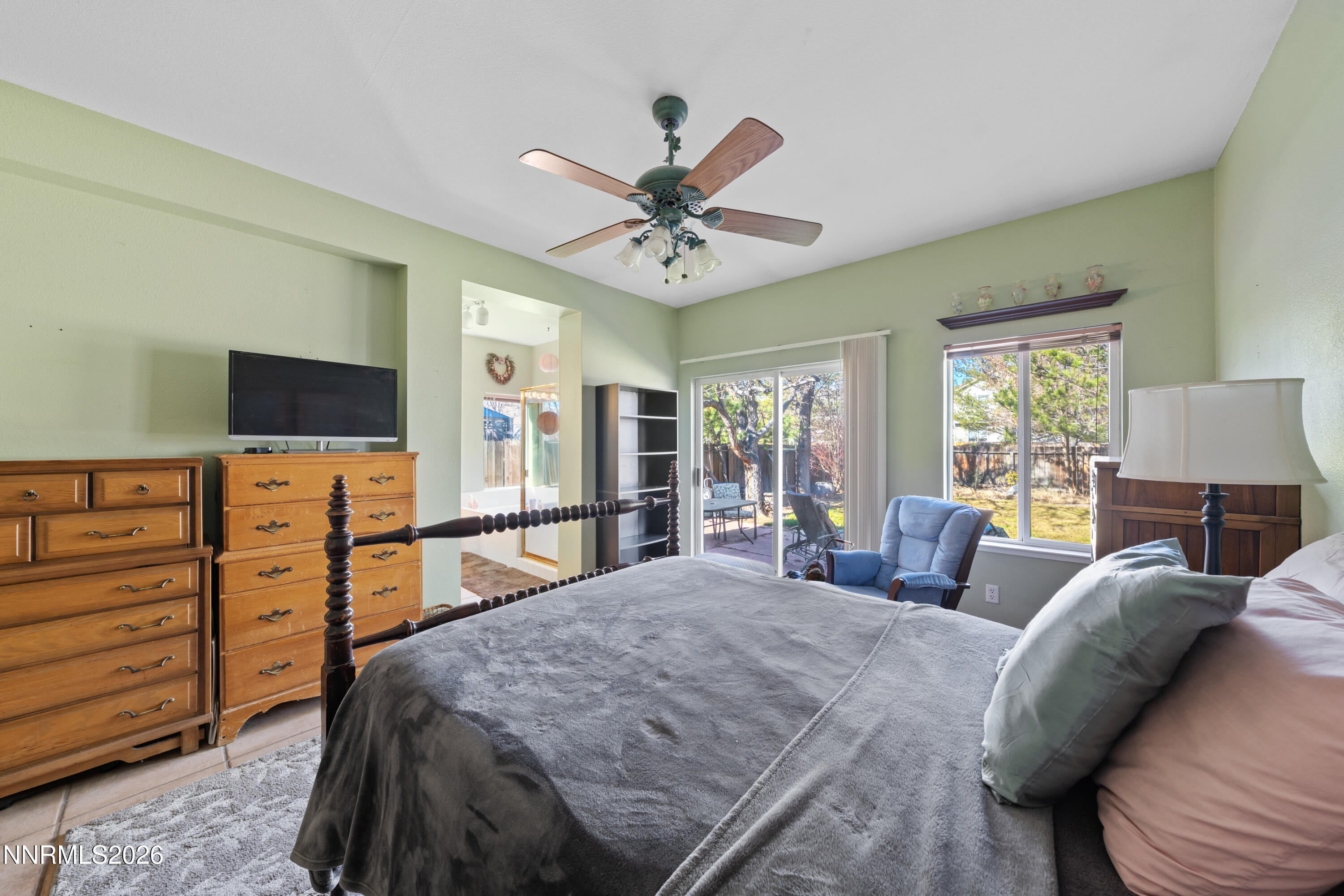 3225 Eaglewood Drive Reno, NV 89502 - Photo 25 of 45 a bed room with a bed a television and dresser